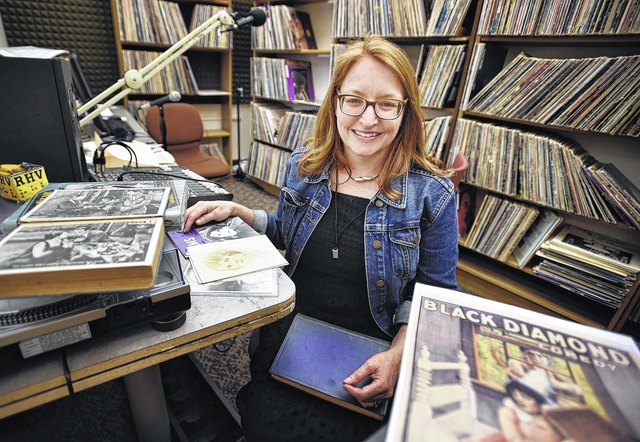 King’s College Professor Noreen O’Connor displays some of her research materials on local film history in the college radio studio, where she broadcasts a weekly radio show. Aimee Dilger | Times Leader